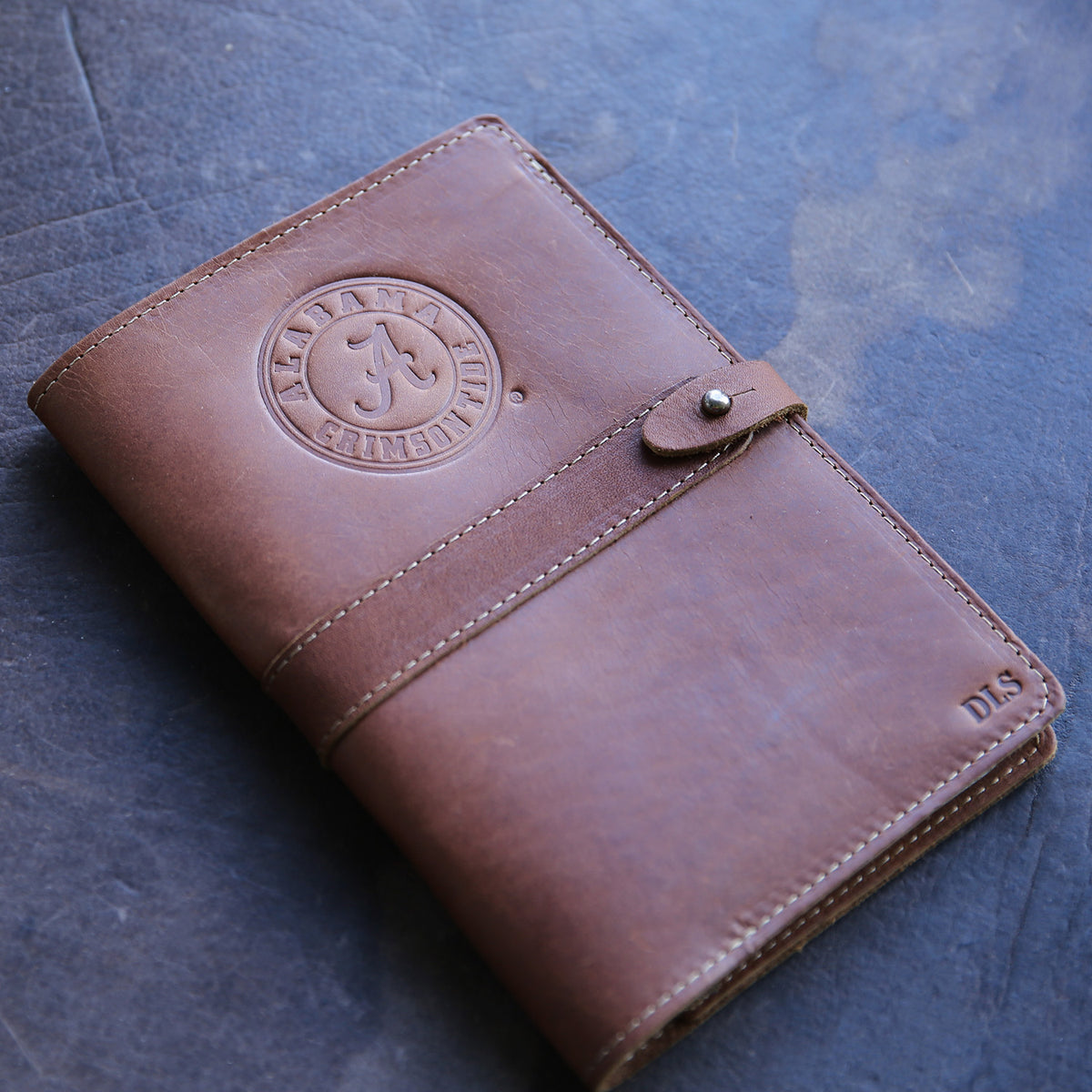 Leather journal with Alabama Crimson Tide logo and personalized initials from Shoporiaz Co in Huntsville, Alabama