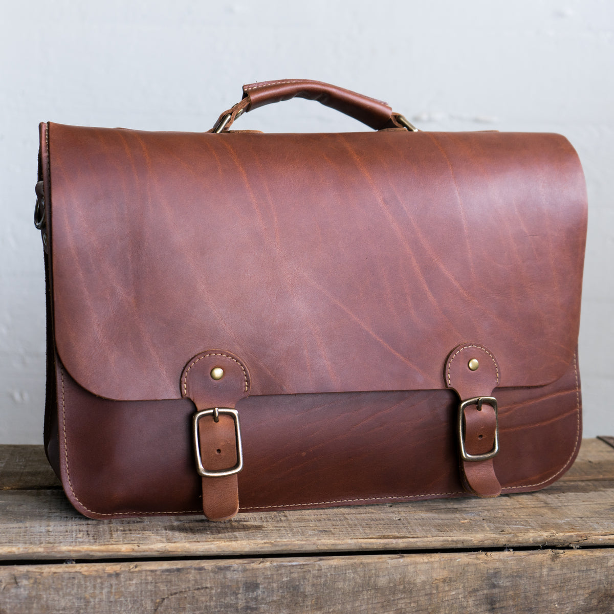 Leather messenger bag/briefcase with buckles from Shoporiaz Co in Huntsville, Alabama