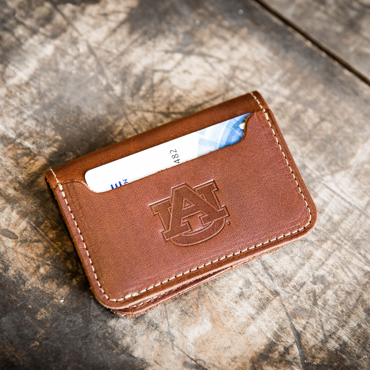 The Officially Licensed  Auburn Gates Fine Leather Bifold Money Clip Wallet