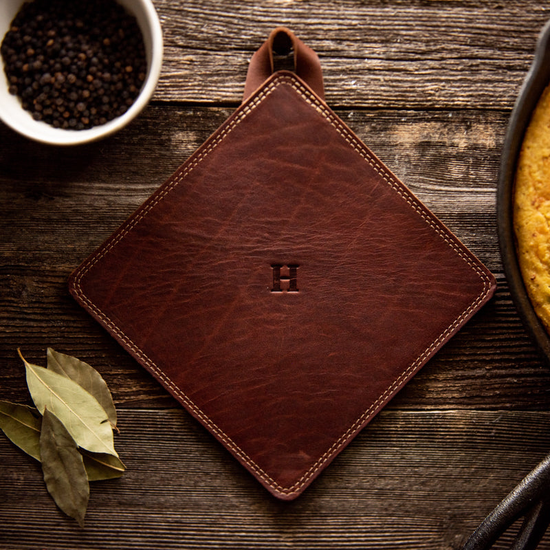 Trivet made of fine American leather with a personalized initial. From Shoporiaz Co in Huntsville, Alabama