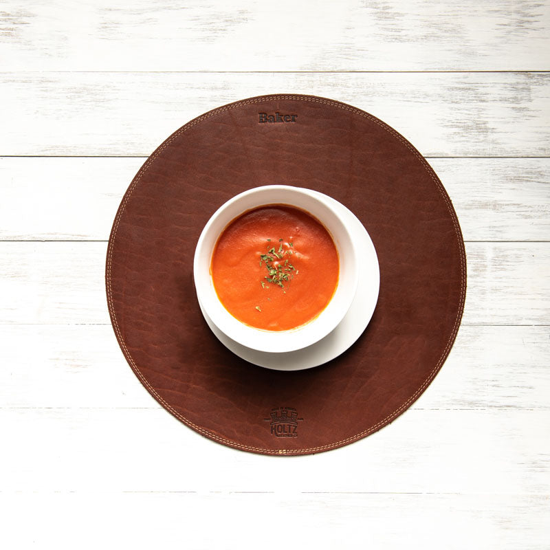 Fine leather round placemat with personalized named and Shoporiaz Co logo