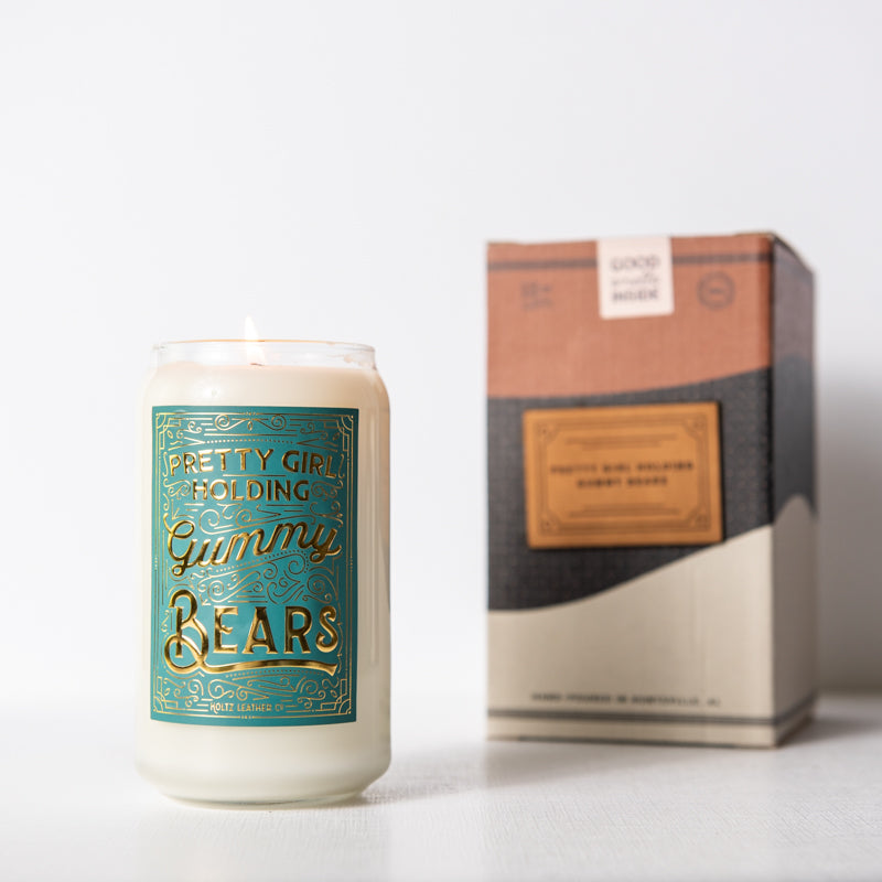 Pretty Girl Holding Gummy Bears scented candle in glass jar with Coco & Loco Box, hand-poured by Shoporiaz Co in Huntsville, Alabama